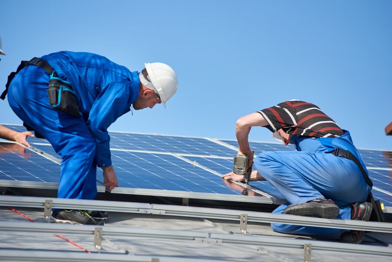 Maintenance Technician Inspecting Panels